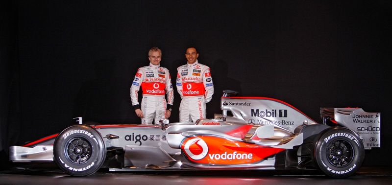 1199719021vodafone_mclaren_mercedes_mp4-23_with_drivers_-_lewis_hamilton___heikki_kovalainen