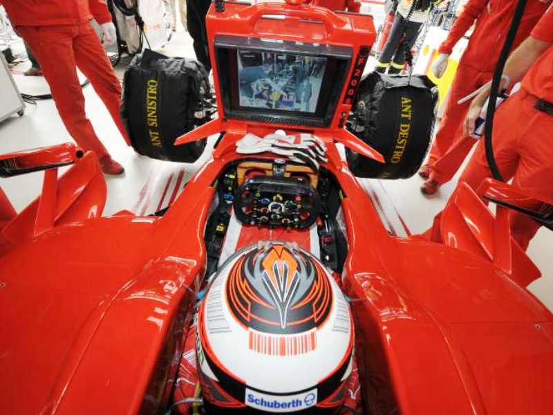 1212663293kimi raikkonen tyre warmers ot ferrari