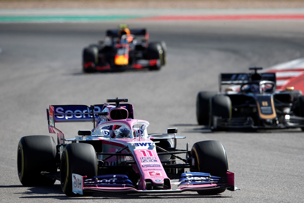 Sergio Perez, Racing Point RP19 and Romain Grosjean, Haas VF-19 Серхио Перес